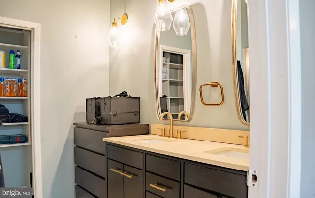 a view of a bathroom with a shower and a window