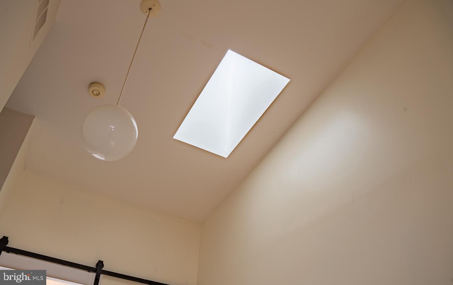 6907 Jones View Drive, Unit 3A Baltimore, MD 21209 - Photo 19 of 19 a bathroom with a sink and mirror