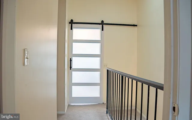 a view of a room with racks on the wall