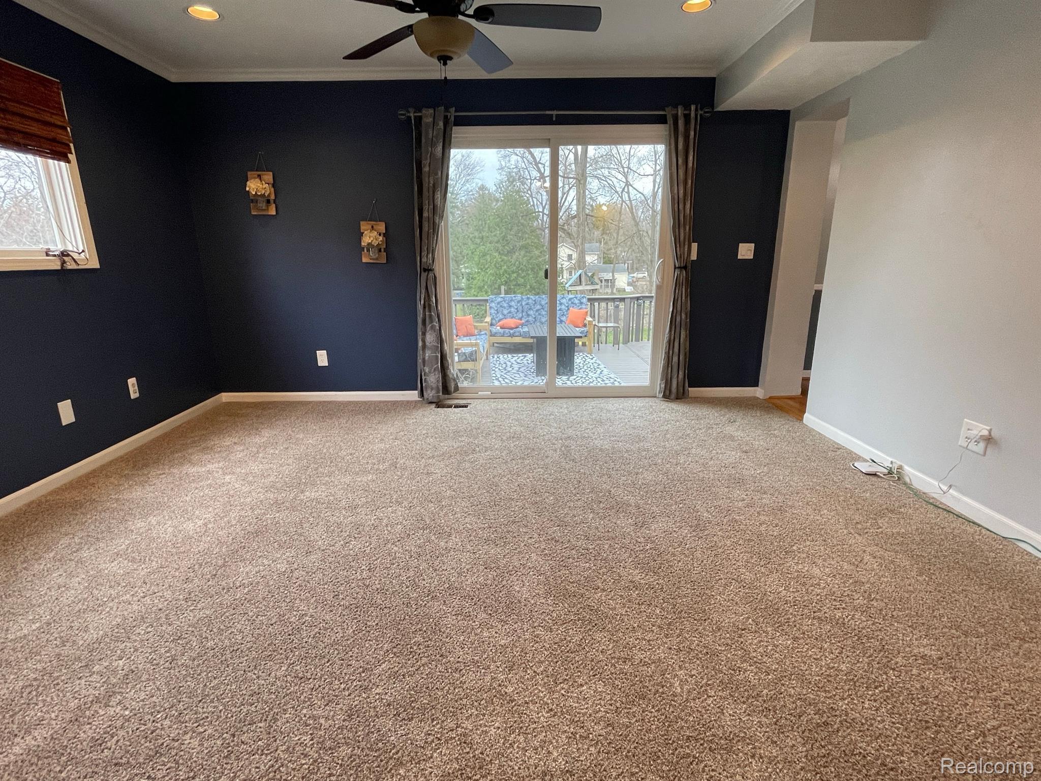 22530 Power Road Farmington, MI 48336 - Photo 12 of 27 Family room with door wall access to the deck