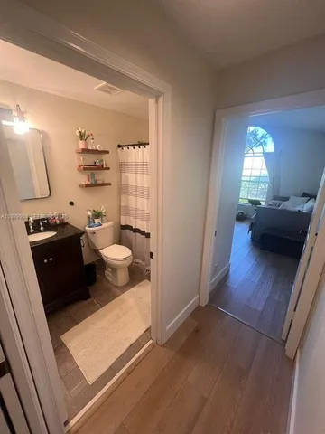 a view of a living room and dining room