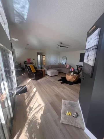 a living room with furniture and a couch