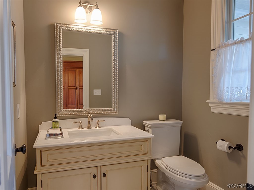 1712 Novum Church Road Reva, VA 22735 - Photo 17 of 40 a bathroom with a sink toilet and mirror