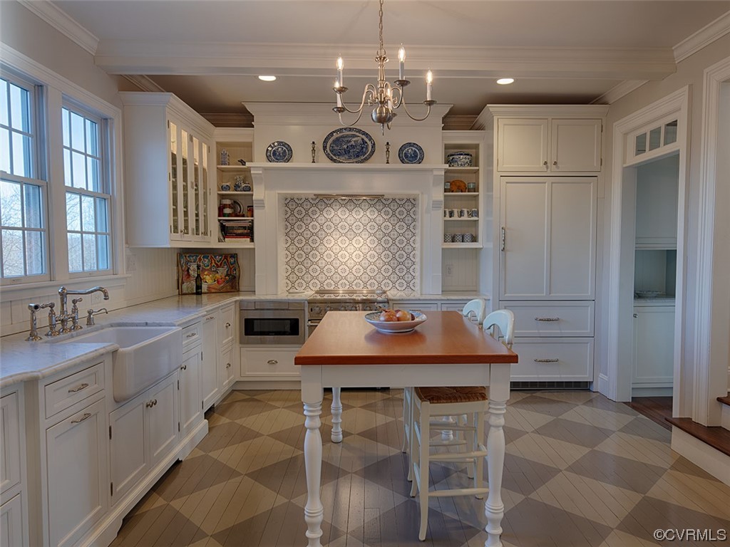 1712 Novum Church Road Reva, VA 22735 - Photo 8 of 40 a view of a kitchen with kitchen island a sink stainless steel appliances and cabinets