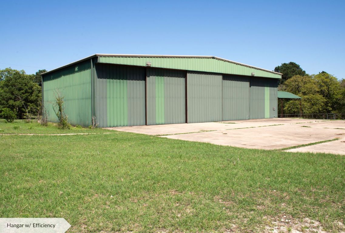 490 John Craft Road Red Rock, TX 78662 - Photo 11 of 40 a house with green field in front of it