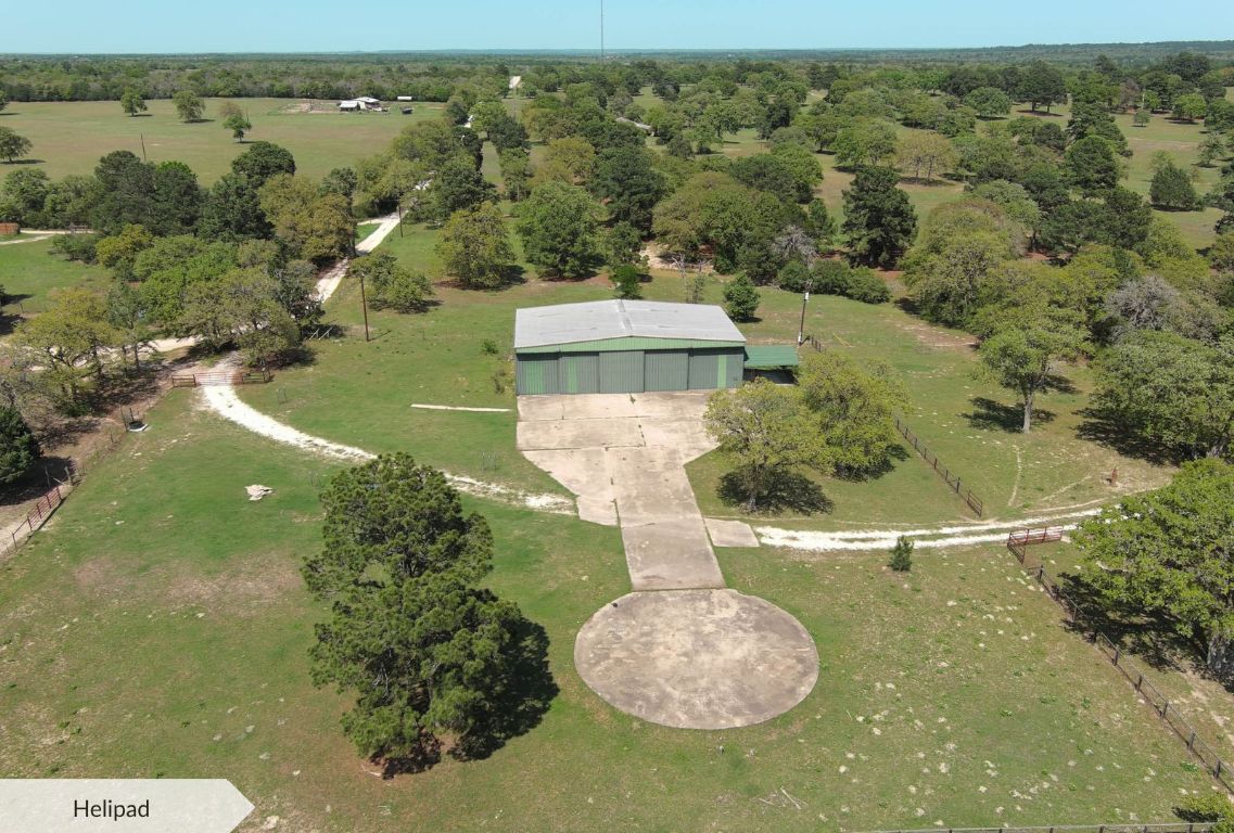 490 John Craft Road Red Rock, TX 78662 - Photo 9 of 40 an aerial view of a house with a yard