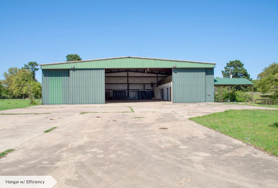490 John Craft Road Red Rock, TX 78662 - Photo 10 of 40 a front view of a house with a yard and garage
