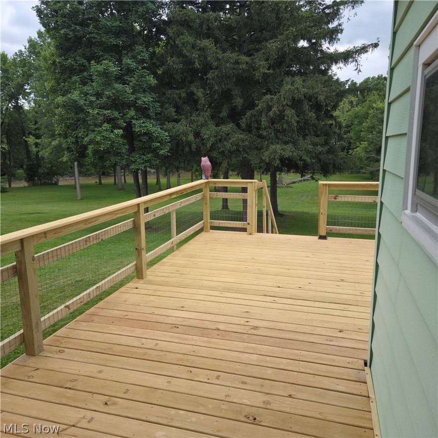 9964 East River Road Elyria, OH 44035 - Photo 6 of 45 Spacious wood-finish deck with integrated stairs and wire mesh railings
