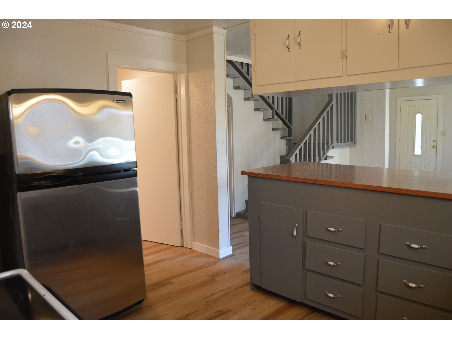 705 Couch Avenue Wallowa, OR 97885 - Photo 28 of 35 a bathroom with a sink and a mirror