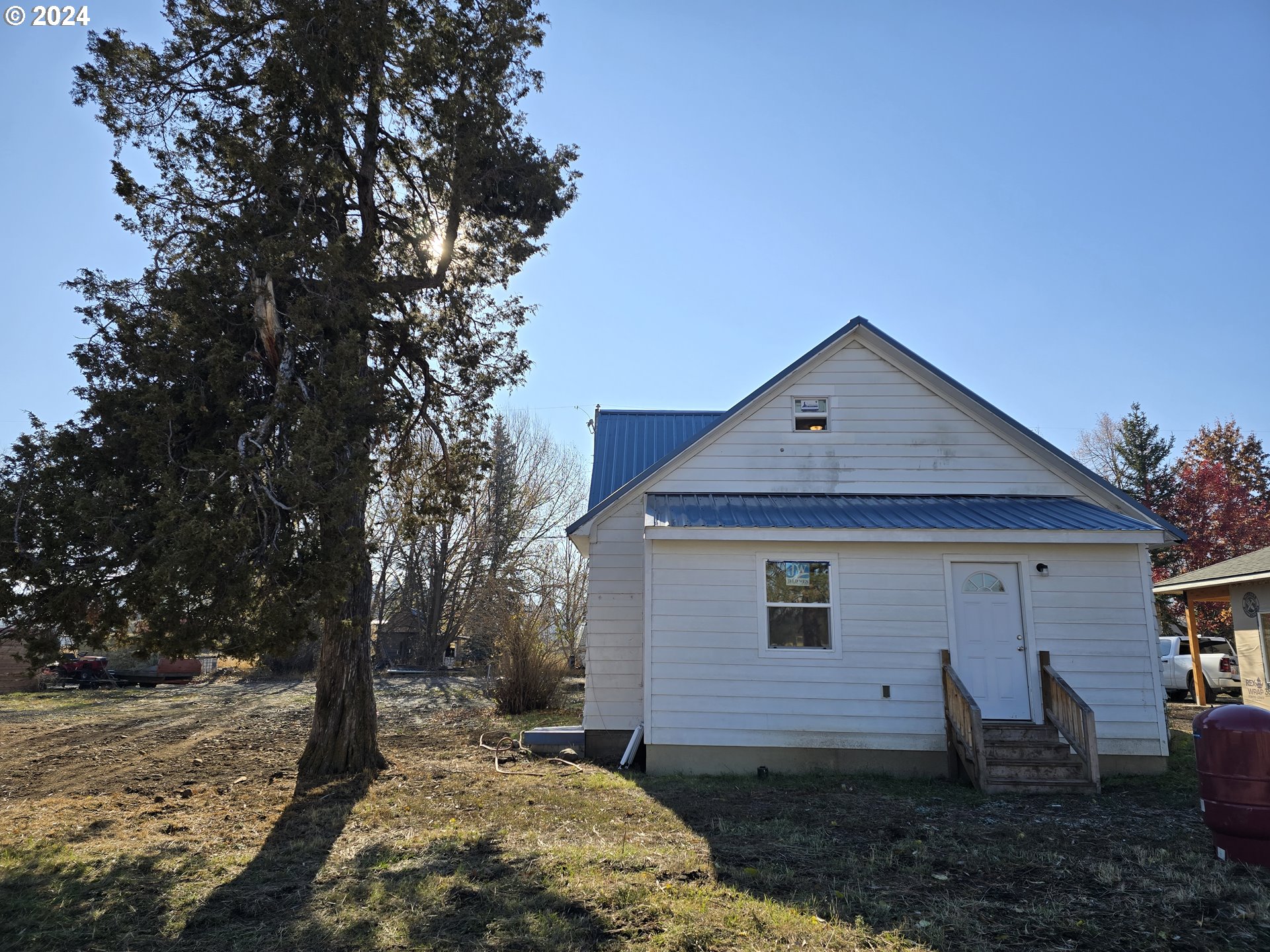 705 Couch Avenue Wallowa, OR 97885 - Photo 4 of 35 a view of a house with a yard