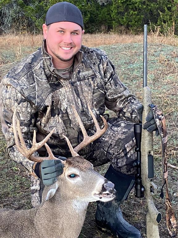 144 Walnut Springs Walnut Springs, TX 76690 - Photo 11 of 14 a view of a backyard with table and chairs