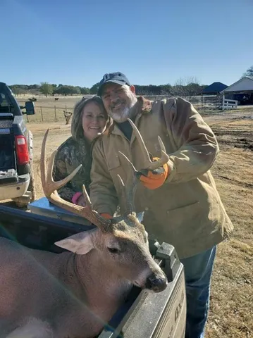 a table and chairs in a garden