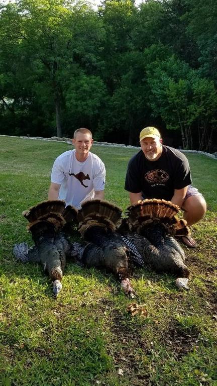 144 Walnut Springs Walnut Springs, TX 76690 - Photo 7 of 14 a table and chairs in a garden