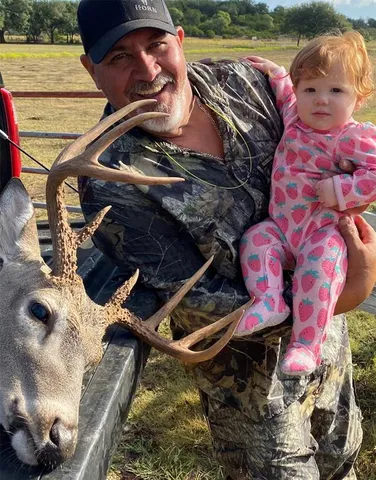a view of a backyard with table and chairs