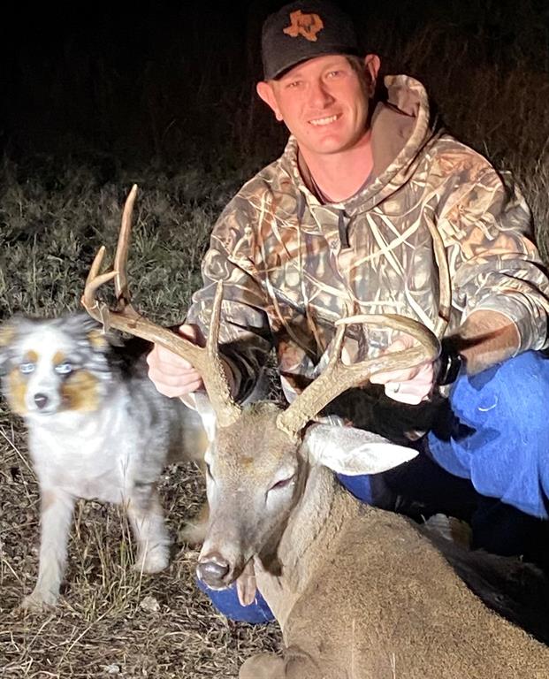 144 Walnut Springs Walnut Springs, TX 76690 - Photo 10 of 14 a bedroom with a bed and a painting on the wall