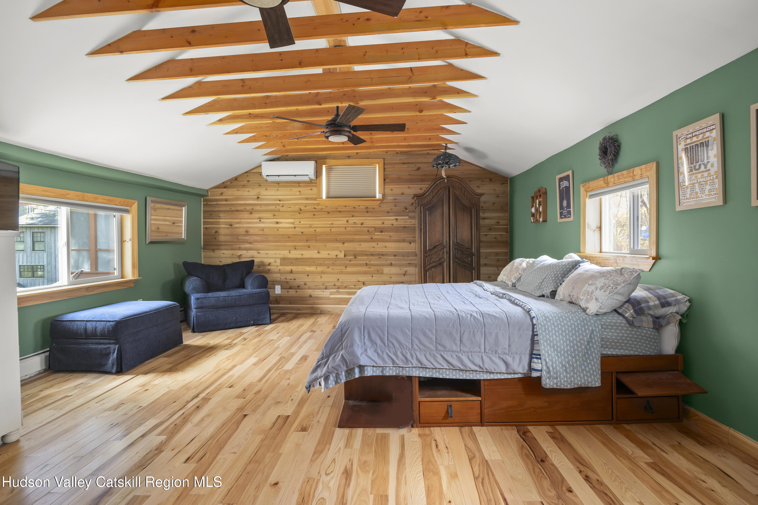 16 Robin Road Copake, NY 12521 - Photo 14 of 23 a bedroom with a bed and wooden floor