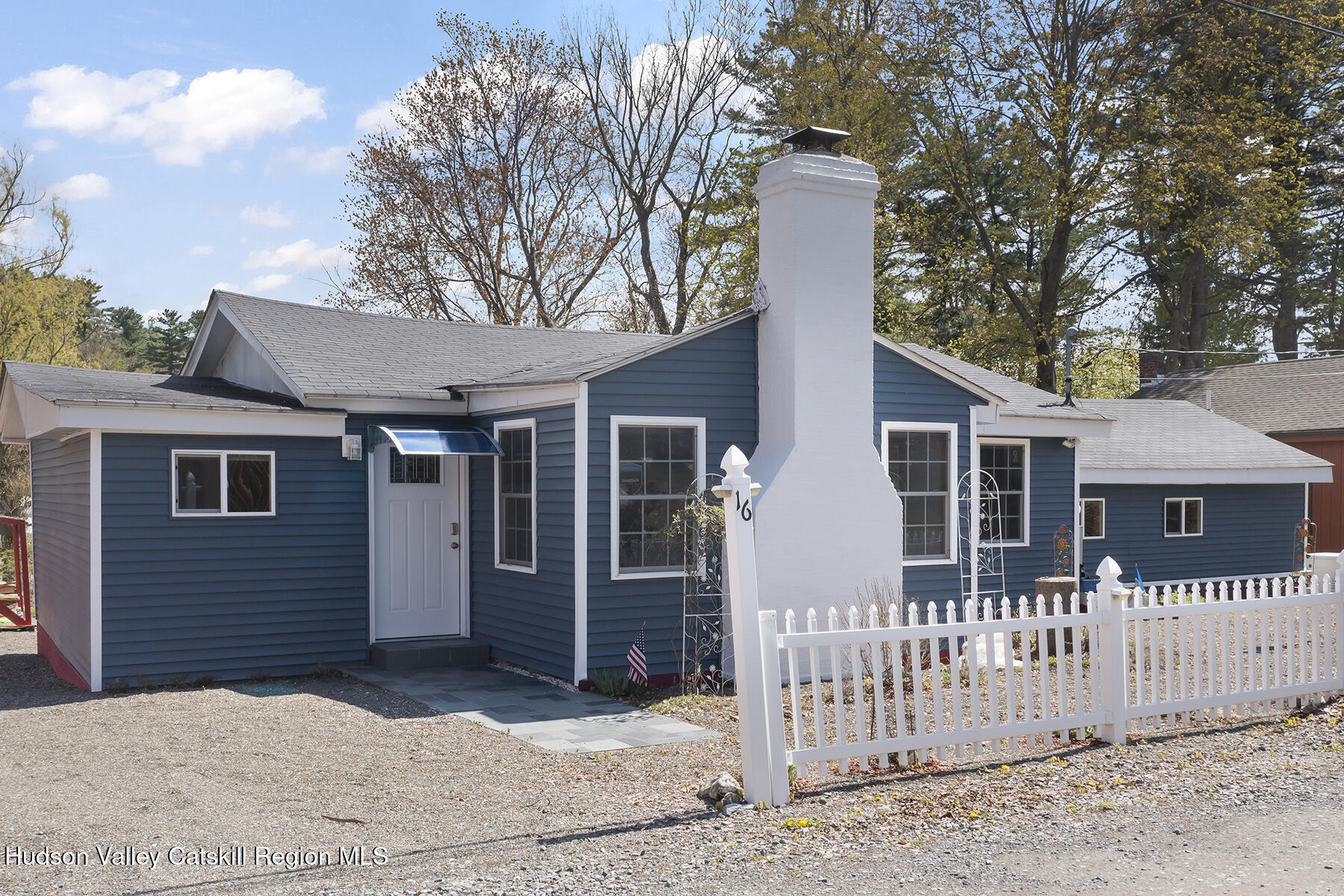 16 Robin Road Copake, NY 12521 - Photo 20 of 23 a front view of a house with a porch