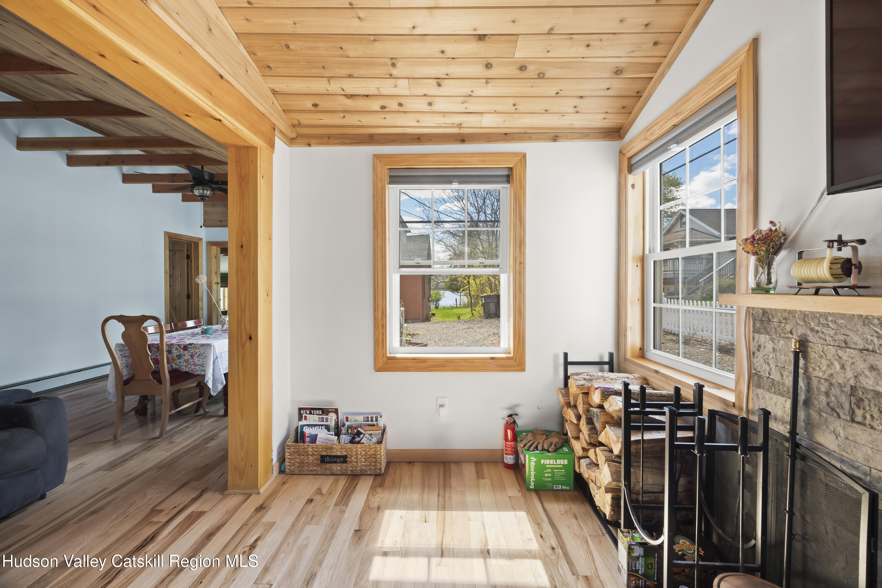 16 Robin Road Copake, NY 12521 - Photo 5 of 23 a balcony with furniture and wooden floor