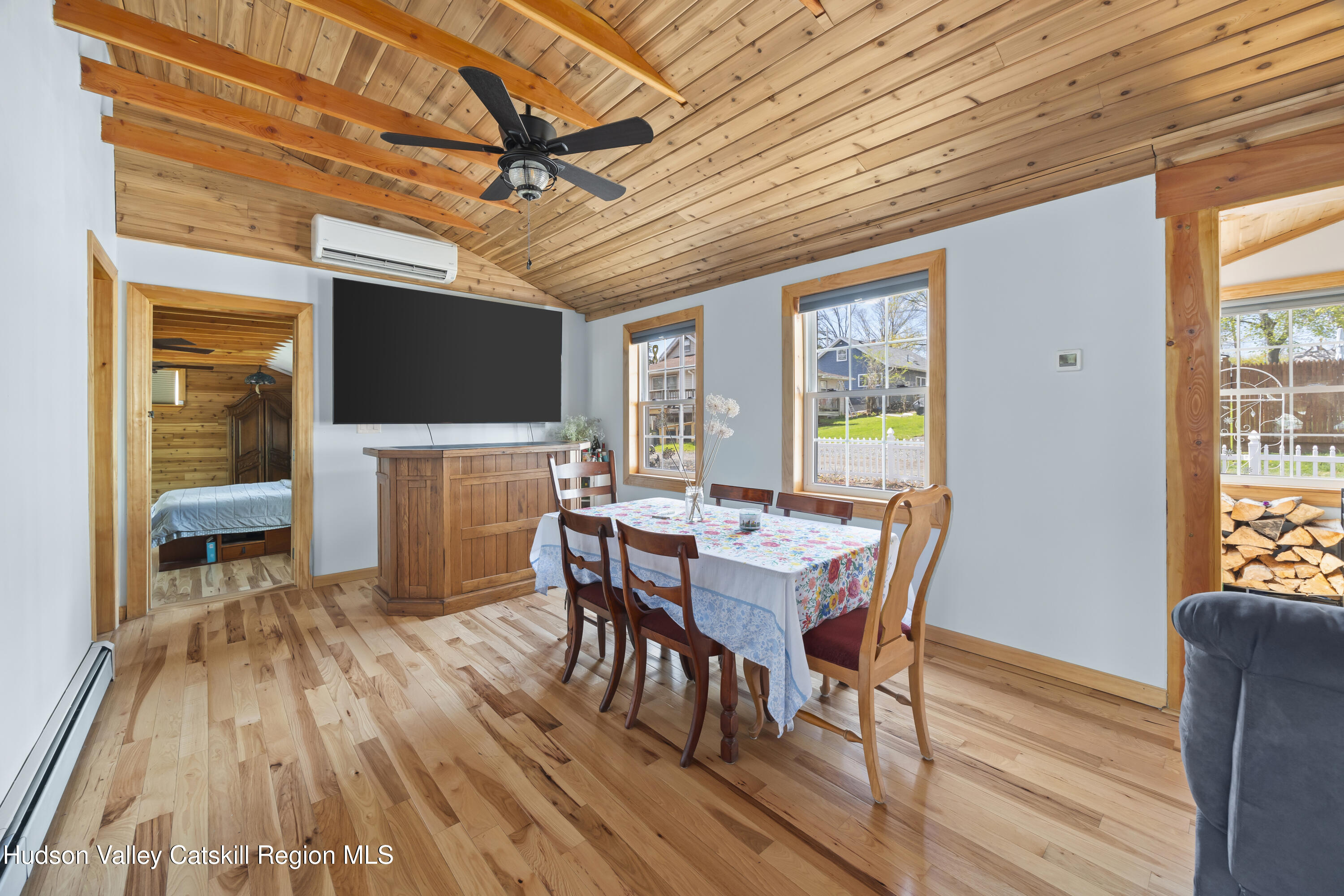 16 Robin Road Copake, NY 12521 - Photo 6 of 23 a view of a dining room with furniture window and wooden floor