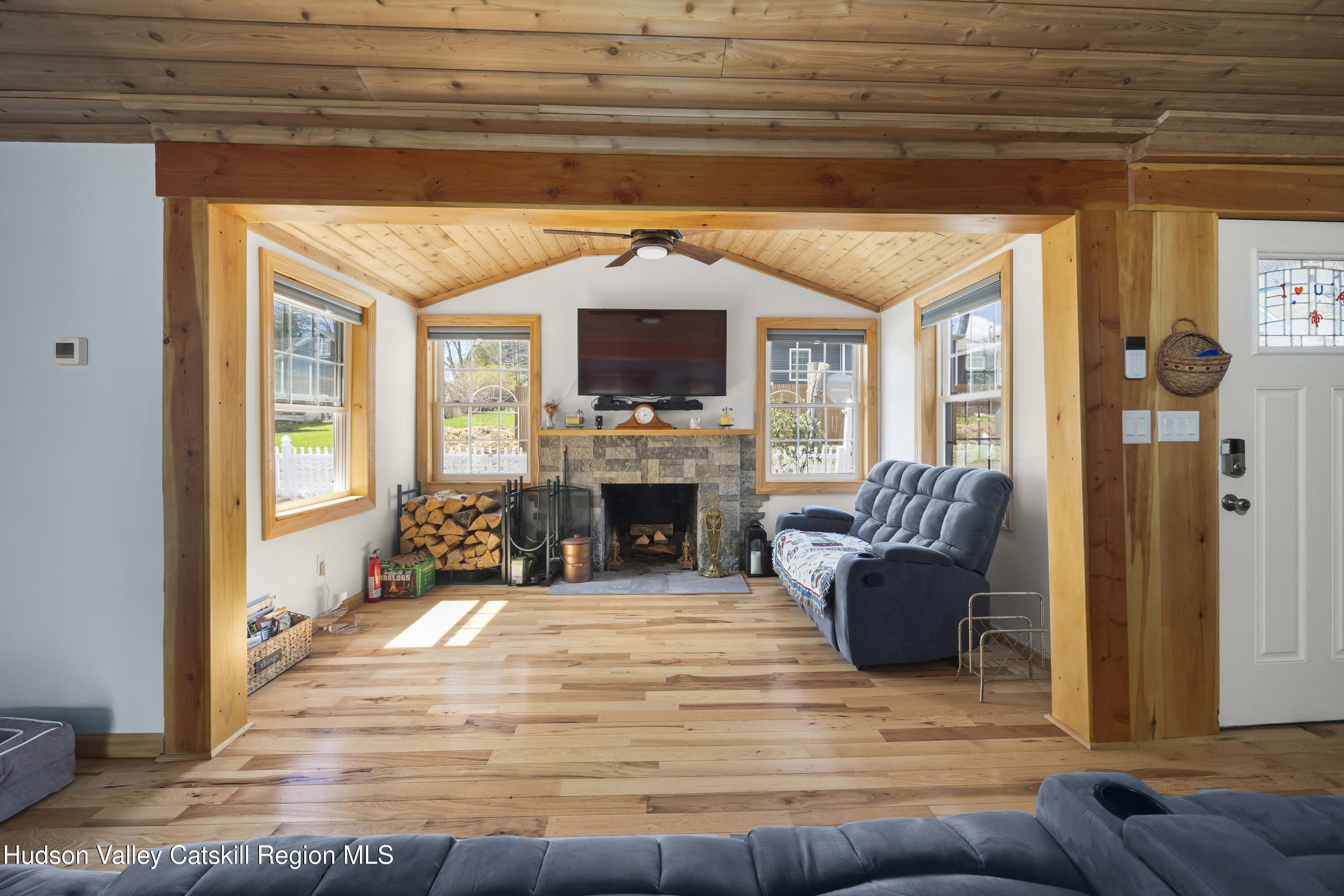 16 Robin Road Copake, NY 12521 - Photo 7 of 23 a living room with furniture and a fireplace