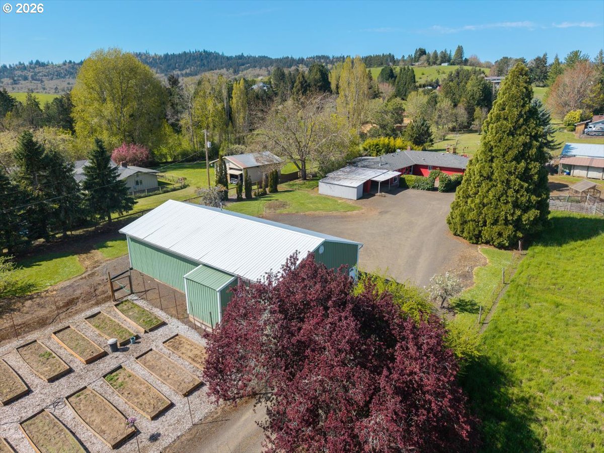 2035 Primrose Loop Philomath, OR 97370 - Photo 15 of 48 an aerial view of a house with a yard