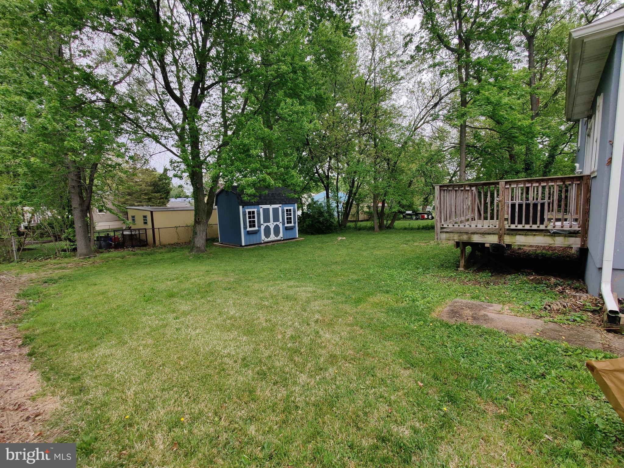 115 Robert Kennedy Road Lawnside, NJ 08045 - Photo 3 of 26 backyard with deck, new shed(included)