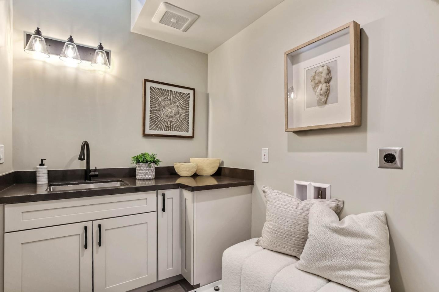 269 Willow Road Menlo Park, CA 94025 - Photo 11 of 26 a kitchen with a sink and cabinets