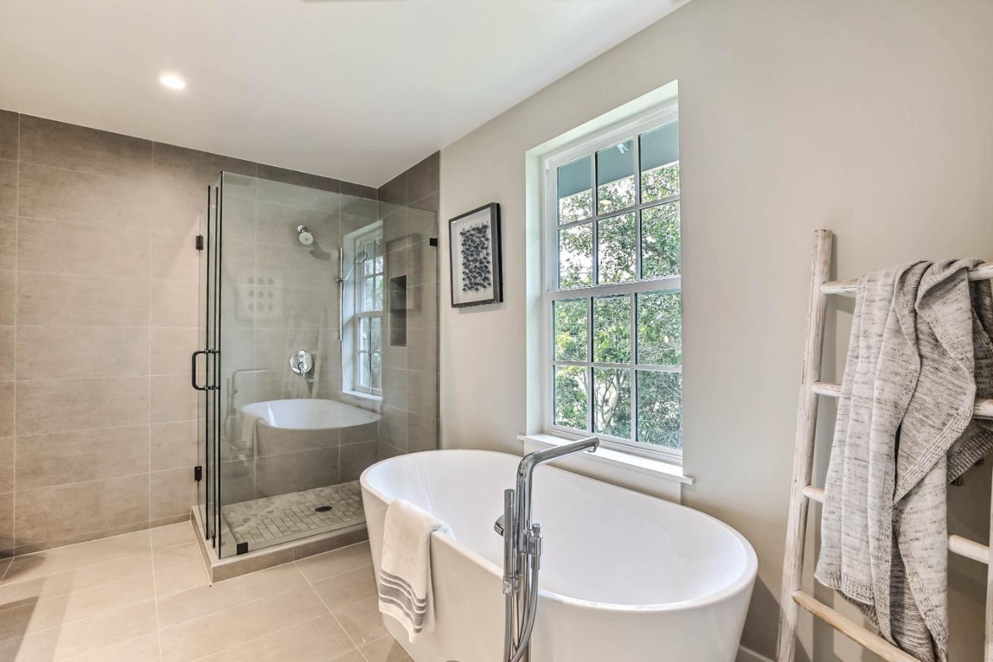 269 Willow Road Menlo Park, CA 94025 - Photo 14 of 26 a bathroom with a tub sink and mirror