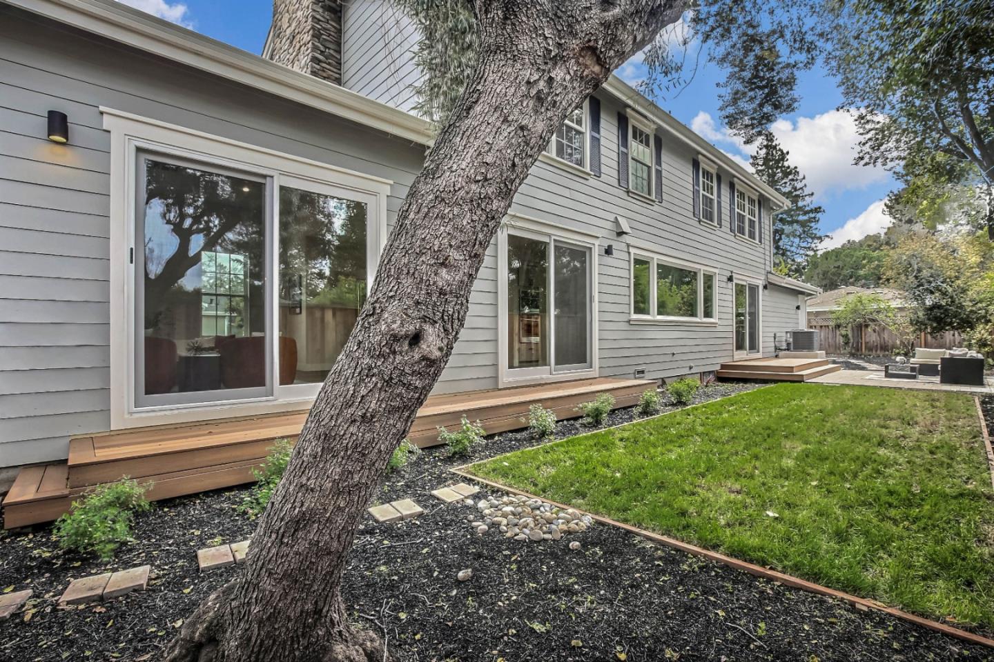 269 Willow Road Menlo Park, CA 94025 - Photo 15 of 26 a front view of a house with garden