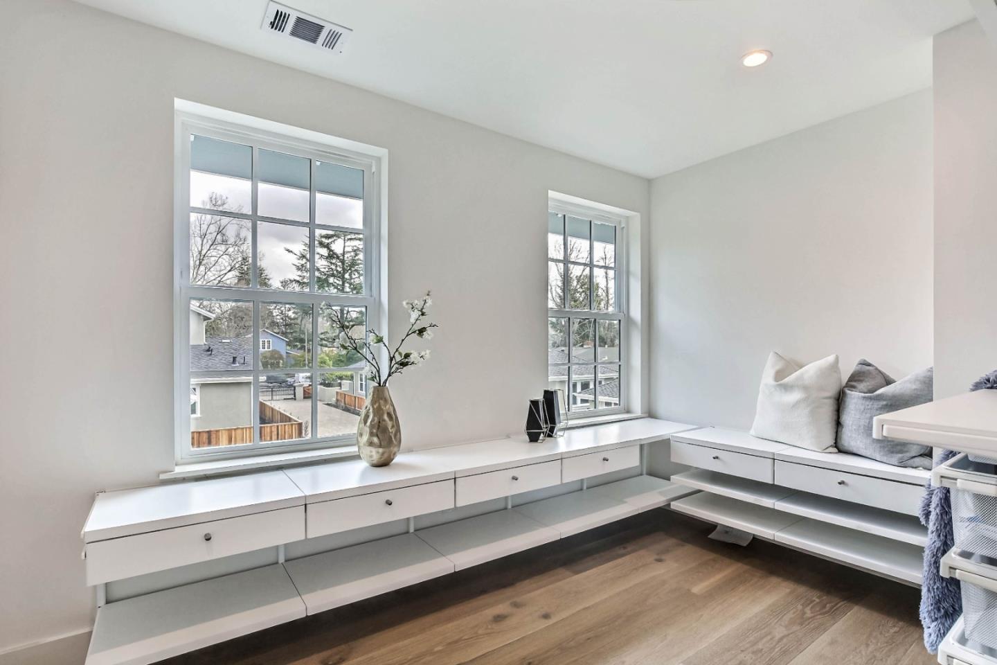 269 Willow Road Menlo Park, CA 94025 - Photo 16 of 26 a view of a room with window and wooden floor