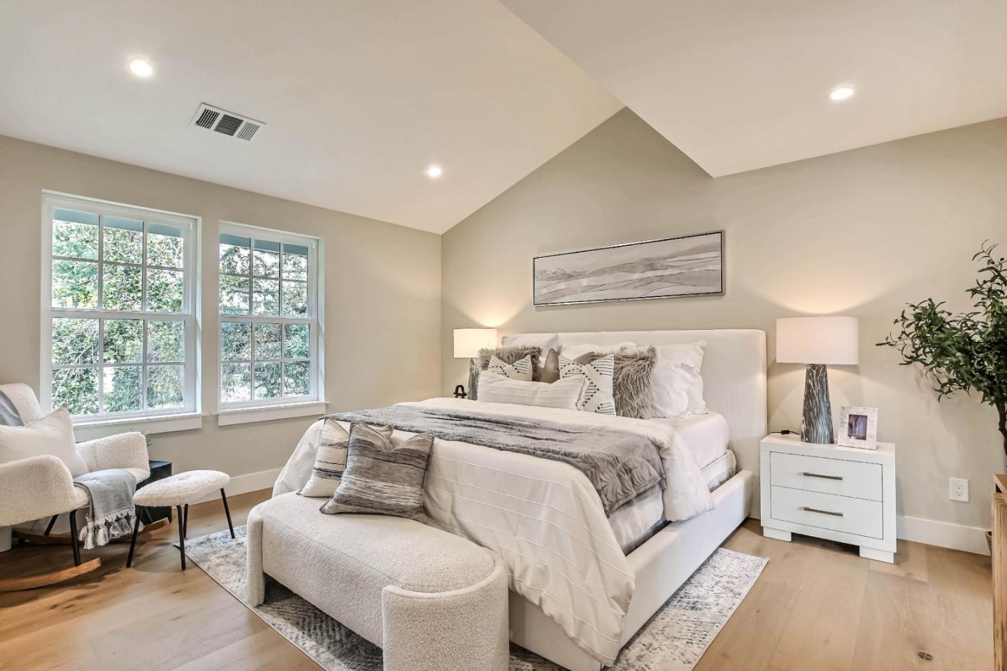 269 Willow Road Menlo Park, CA 94025 - Photo 18 of 26 a bedroom with a bed and a couch