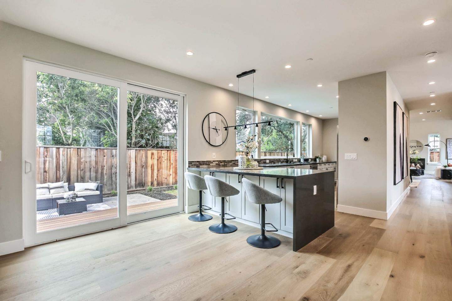 269 Willow Road Menlo Park, CA 94025 - Photo 22 of 26 a view of kitchen with windows and refrigerator