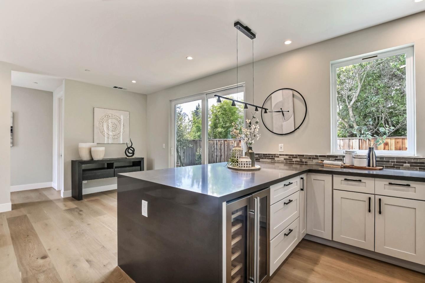 269 Willow Road Menlo Park, CA 94025 - Photo 8 of 26 a kitchen with sink cabinets and window