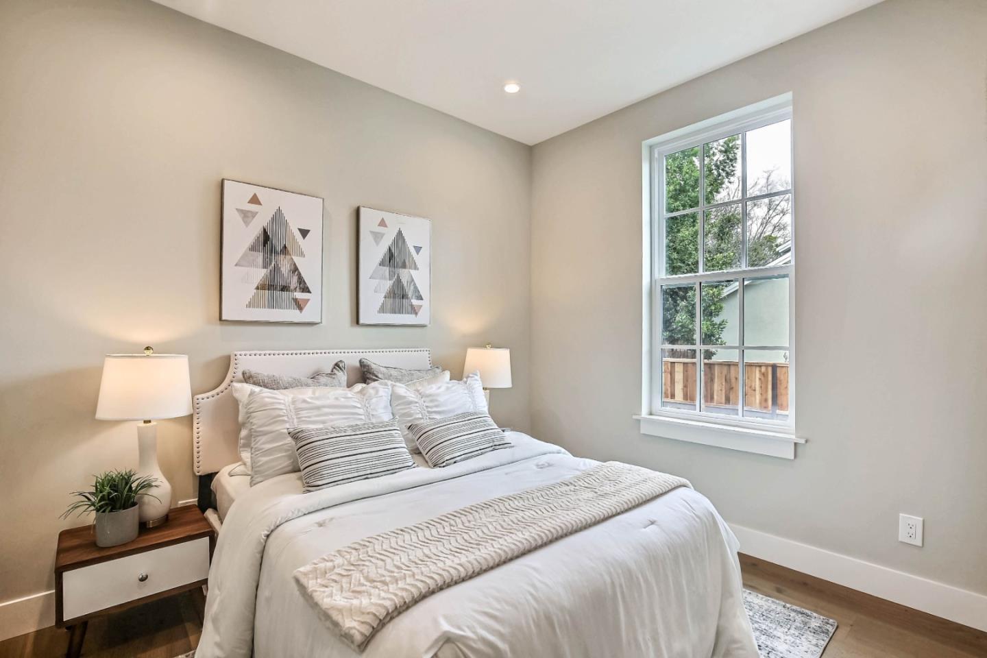 269 Willow Road Menlo Park, CA 94025 - Photo 10 of 26 a bedroom with a bed and a window