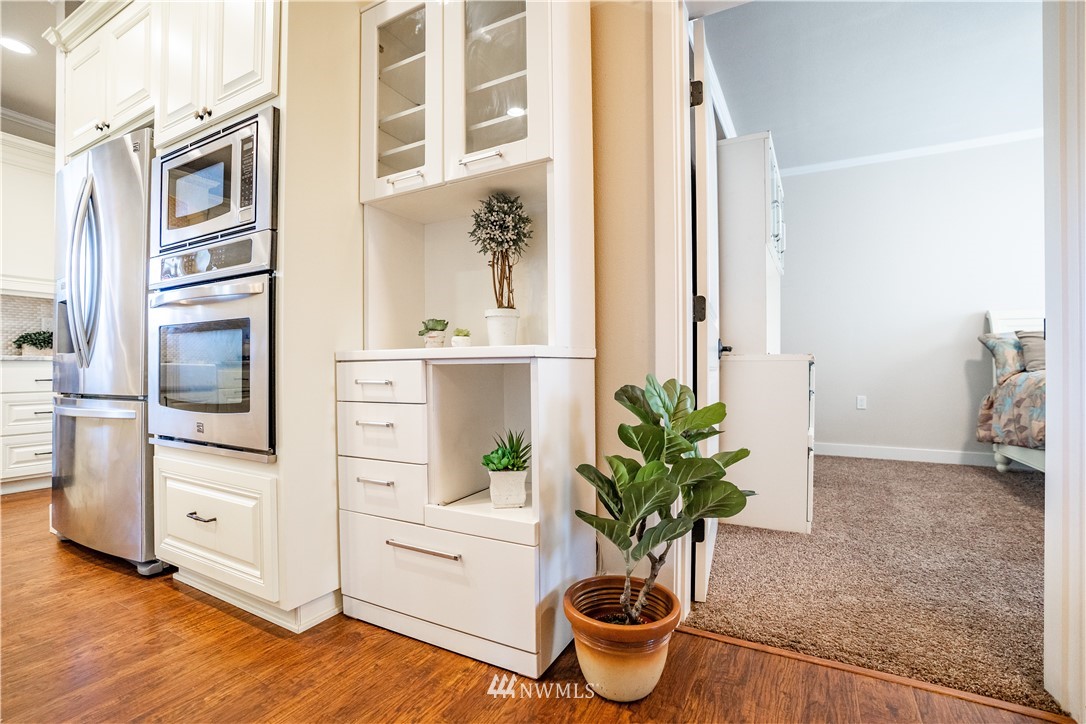 3116 Jackson Highway Chehalis, WA 98532 - Photo 11 of 40 a kitchen with stainless steel appliances a refrigerator and stove