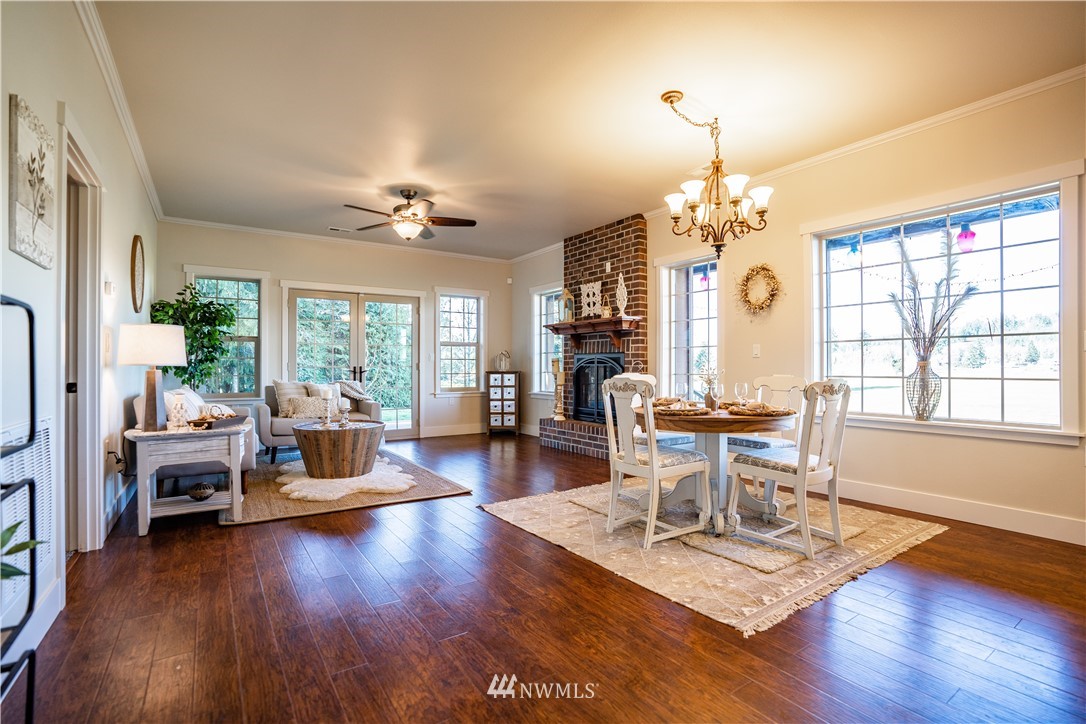 3116 Jackson Highway Chehalis, WA 98532 - Photo 15 of 40 a living room with fireplace furniture and a wooden floor