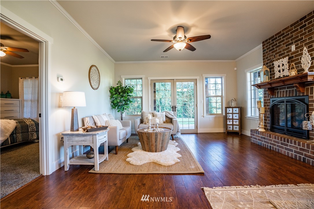 3116 Jackson Highway Chehalis, WA 98532 - Photo 16 of 40 a living room with furniture and a fireplace