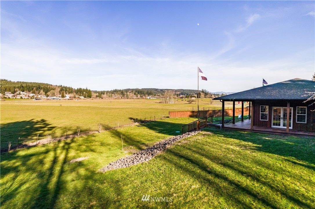 3116 Jackson Highway Chehalis, WA 98532 - Photo 2 of 40 a view of a house with pool and ocean view