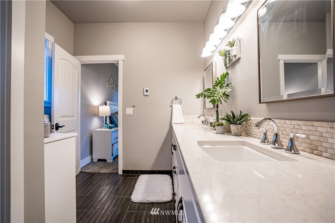 3116 Jackson Highway Chehalis, WA 98532 - Photo 24 of 40 a bathroom with a sink and a mirror