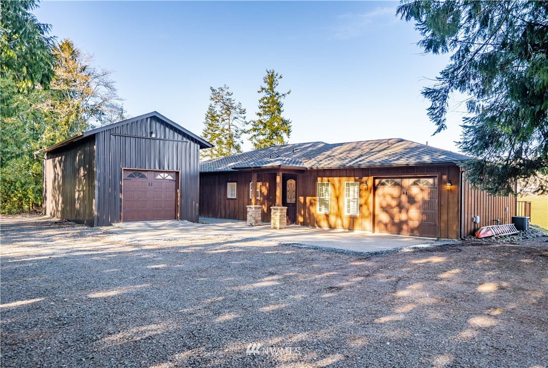 3116 Jackson Highway Chehalis, WA 98532 - Photo 3 of 40 a front view of a house with a yard