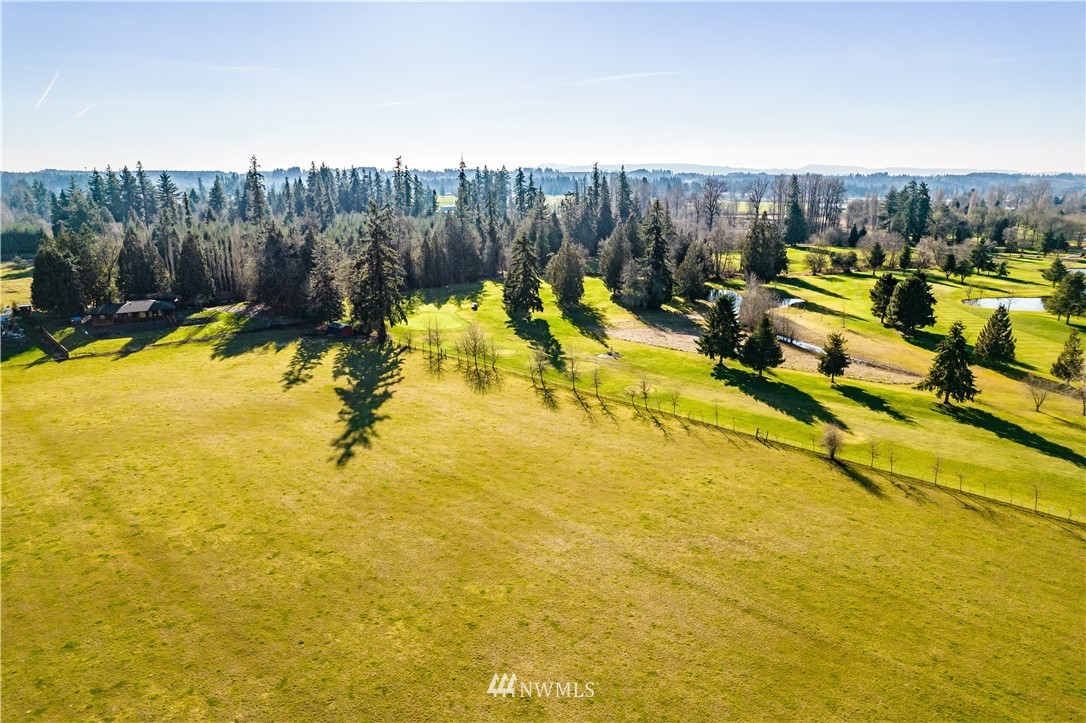 3116 Jackson Highway Chehalis, WA 98532 - Photo 34 of 40 a view of a swimming pool with a yard and furniture