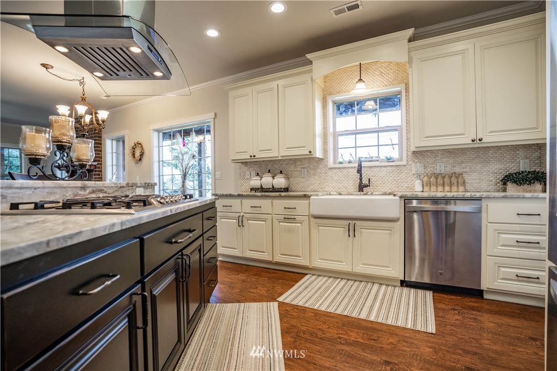 3116 Jackson Highway Chehalis, WA 98532 - Photo 6 of 40 a kitchen with granite countertop a sink cabinets and window