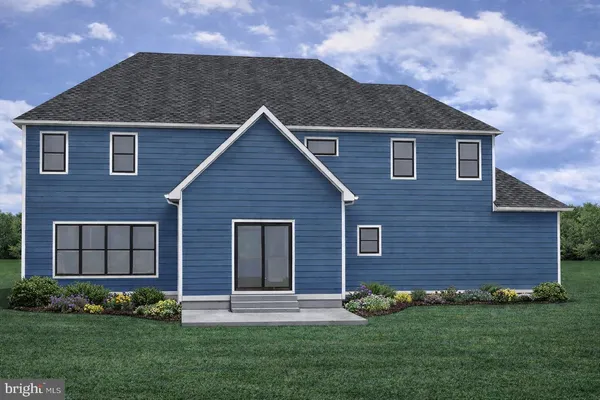 a brick house with a yard