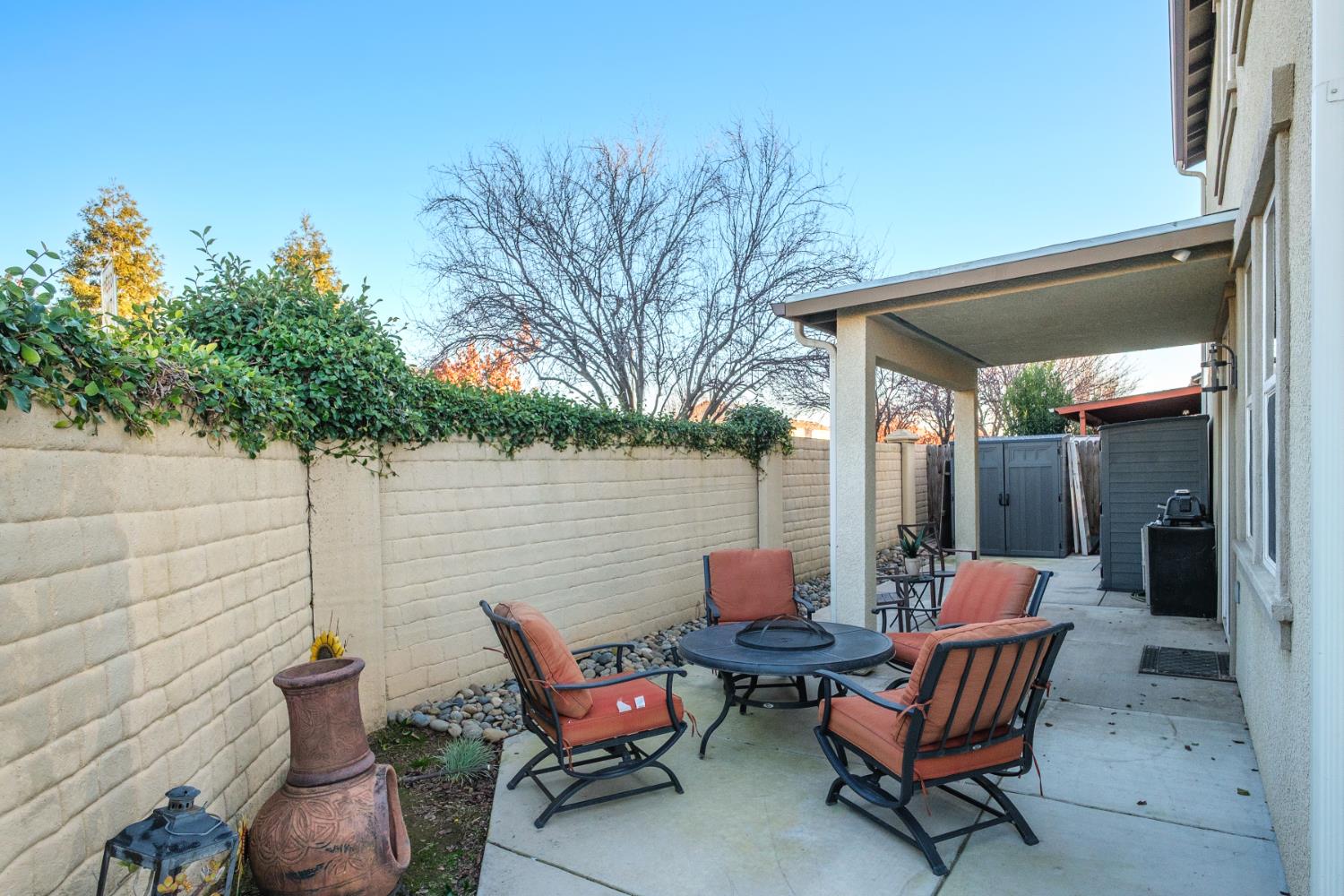 153 Drake Street Madera, CA 93638 - Photo 31 of 34 a view of a chairs and table in the patio