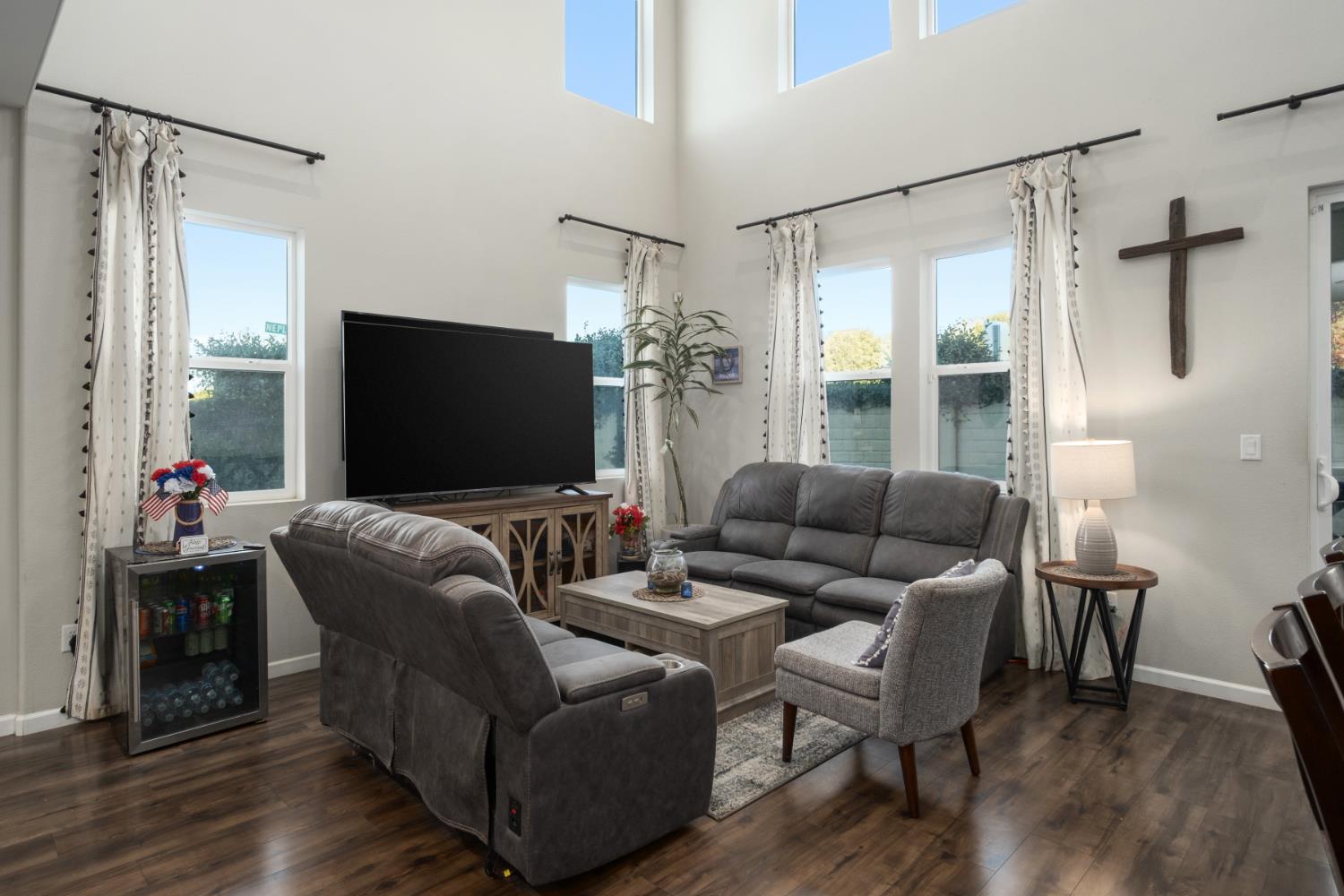 153 Drake Street Madera, CA 93638 - Photo 7 of 34 a living room with furniture and a flat screen tv