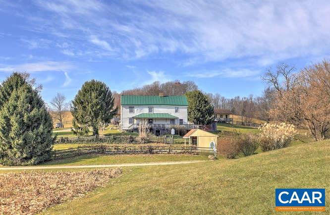 a view of swimming pool with outdoor seating