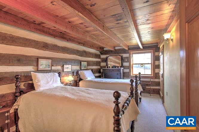 863 Lotts Road Middlebrook, VA 24459 - Photo 13 of 42 a bed room with a bed and a table