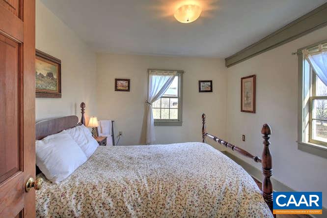 863 Lotts Road Middlebrook, VA 24459 - Photo 16 of 42 a bedroom with a bed and a window