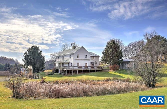 863 Lotts Road Middlebrook, VA 24459 - Photo 2 of 42 a view of a house with a big yard and a large tree
