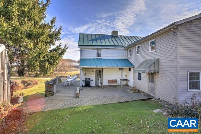 863 Lotts Road Middlebrook, VA 24459 - Photo 22 of 42 a view of a porch with furniture and a fire pit